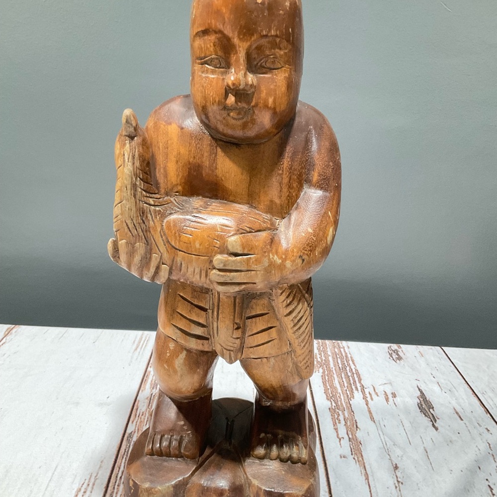 HANDCRAFTED WOODEN STATUE